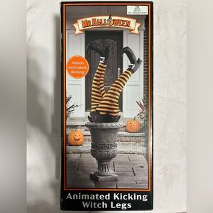 Animated Kicking Witch Legs - Black and Orange